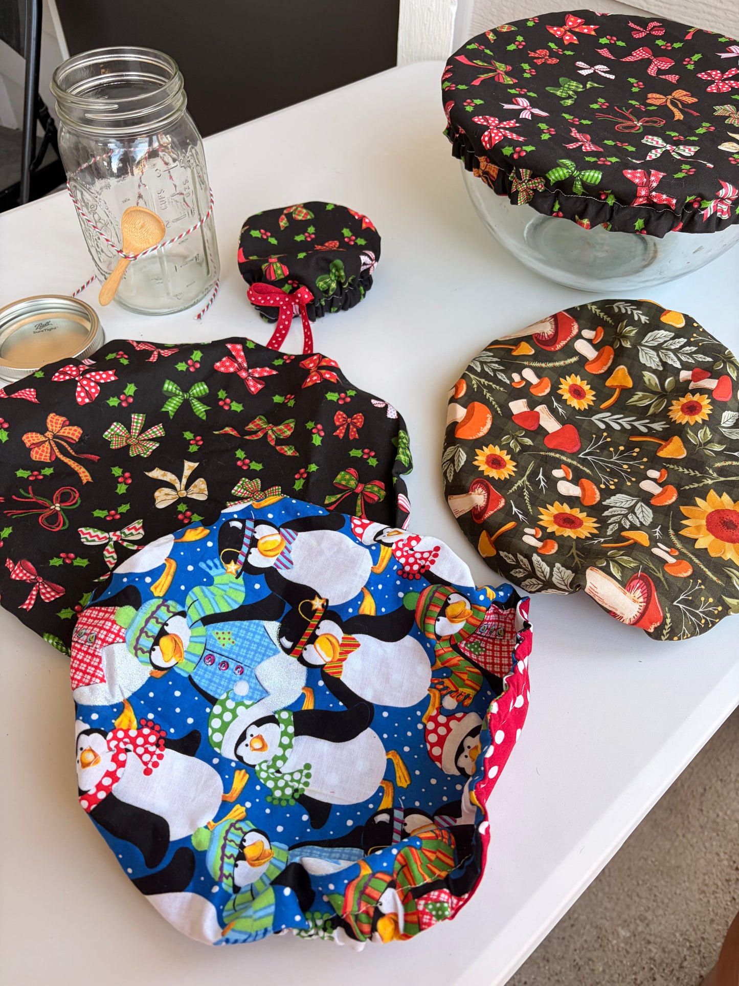 Large Mason Jar filled with Reversible Holiday Print Baking Bowl Covers