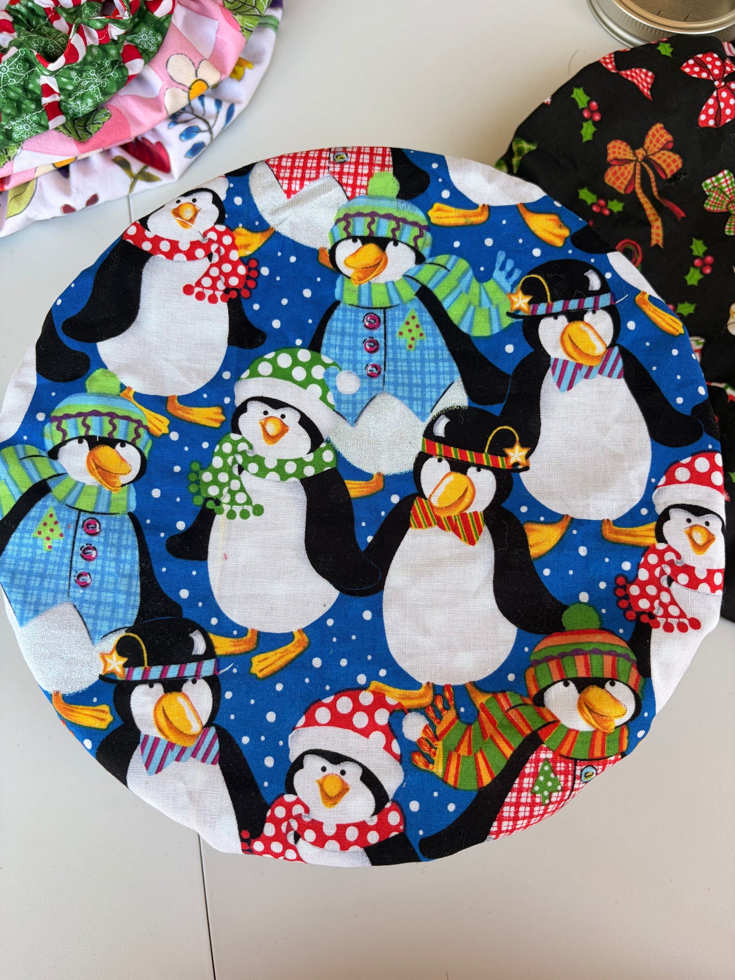 Christmas Baking Bowl Cover in a Blue Happy Penguin print
