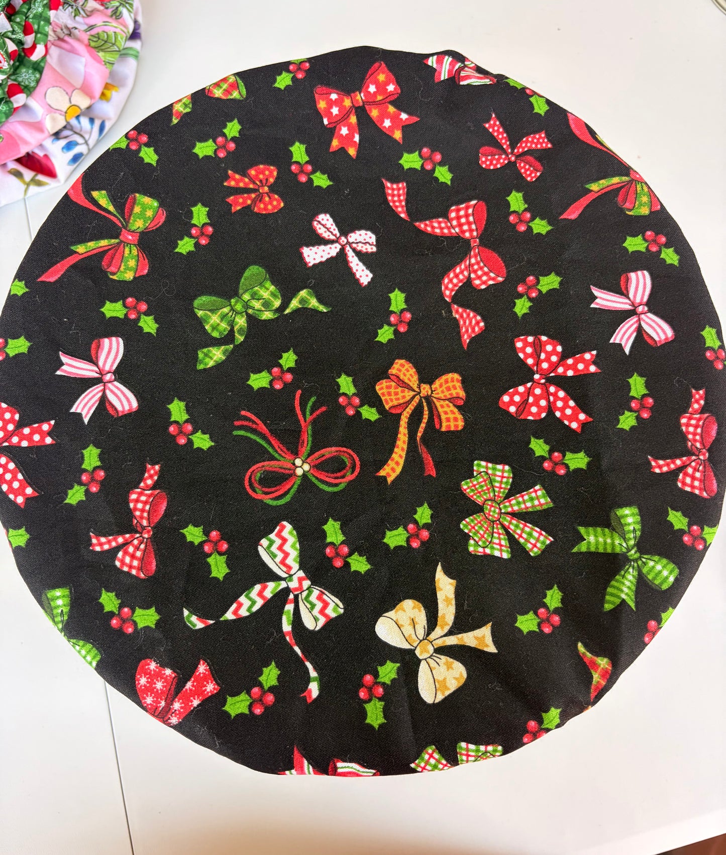 Christmas Baking Bowl Cover with Colorful Christmas Bows print on elegant black background