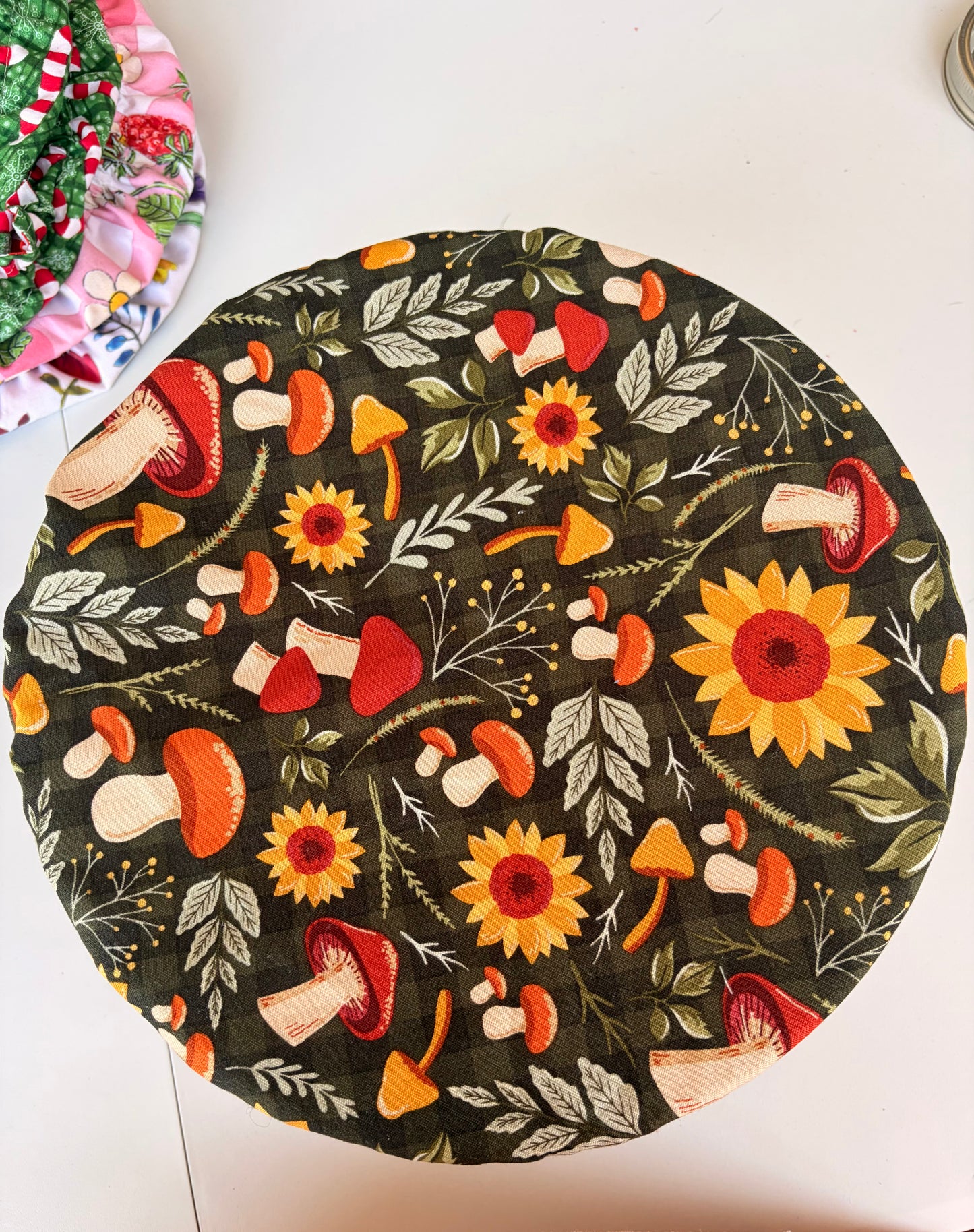 Large Mason Jar filled with Reversible Holiday Print Baking Bowl Covers