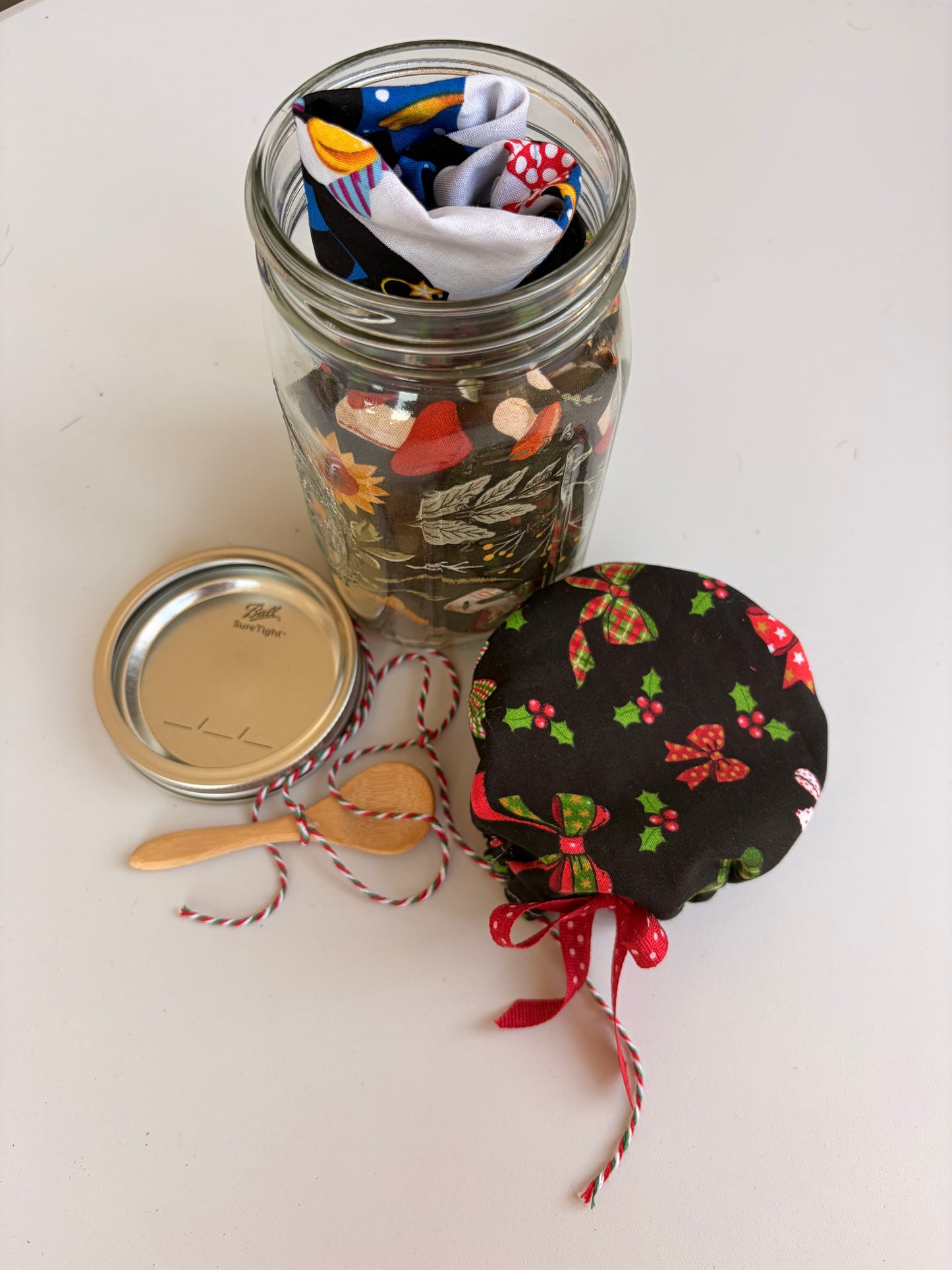 Large Mason Jar filled with Reversible Holiday Print Baking Bowl Covers