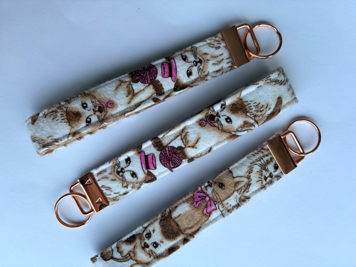 Adult Wristlet, Plush Cats with Pink Bows and Hats.